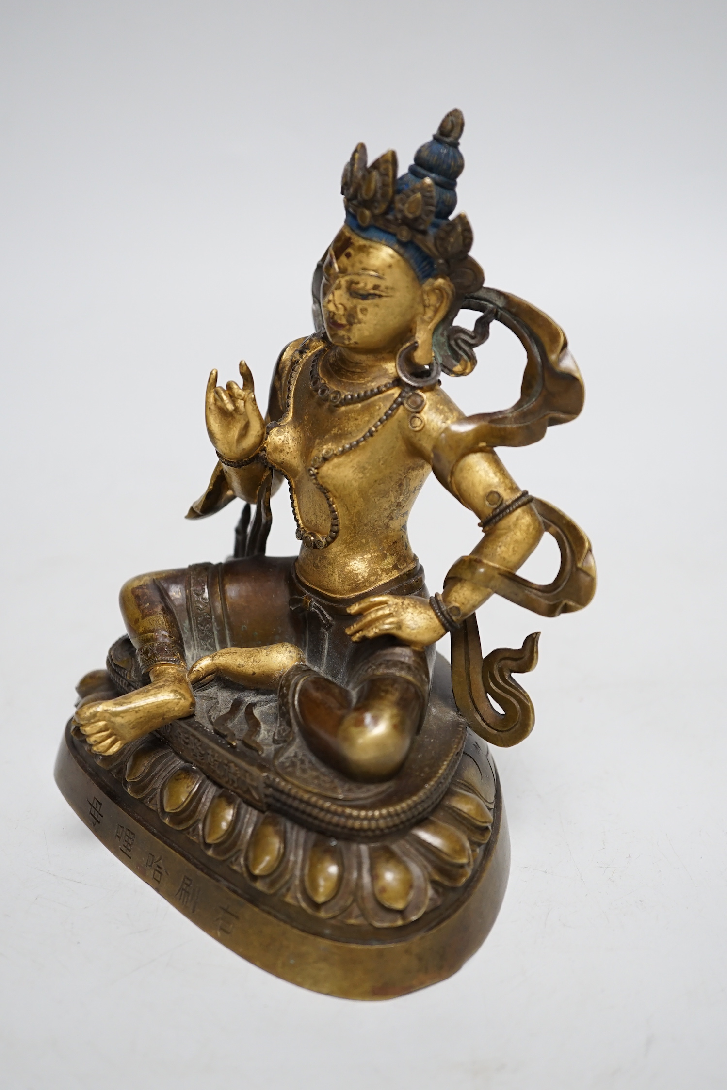 A Chinese gilt bronze figure of Green Tara, 16cm high